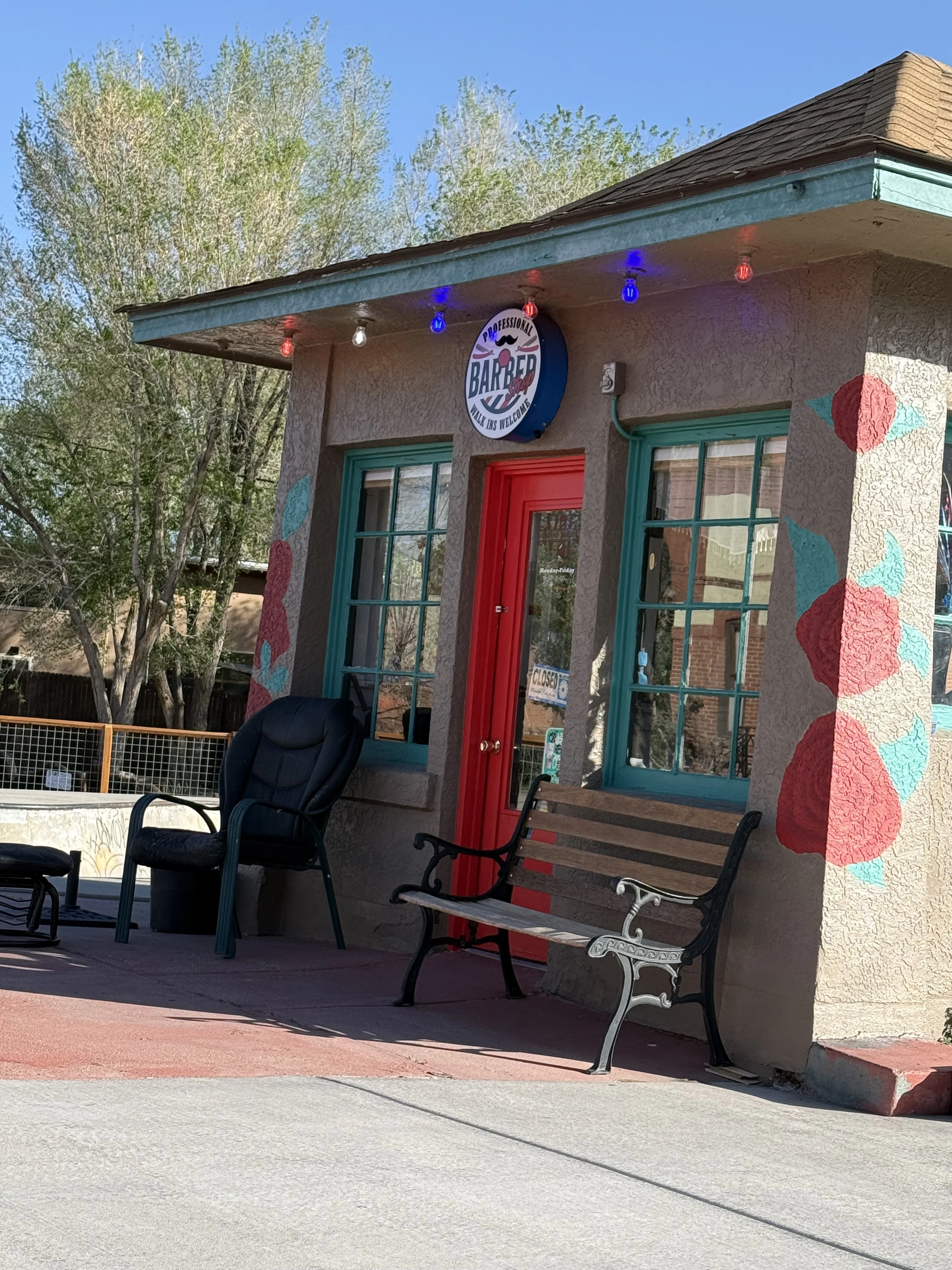 West End Barber storefront with floral mural in Salida, CO