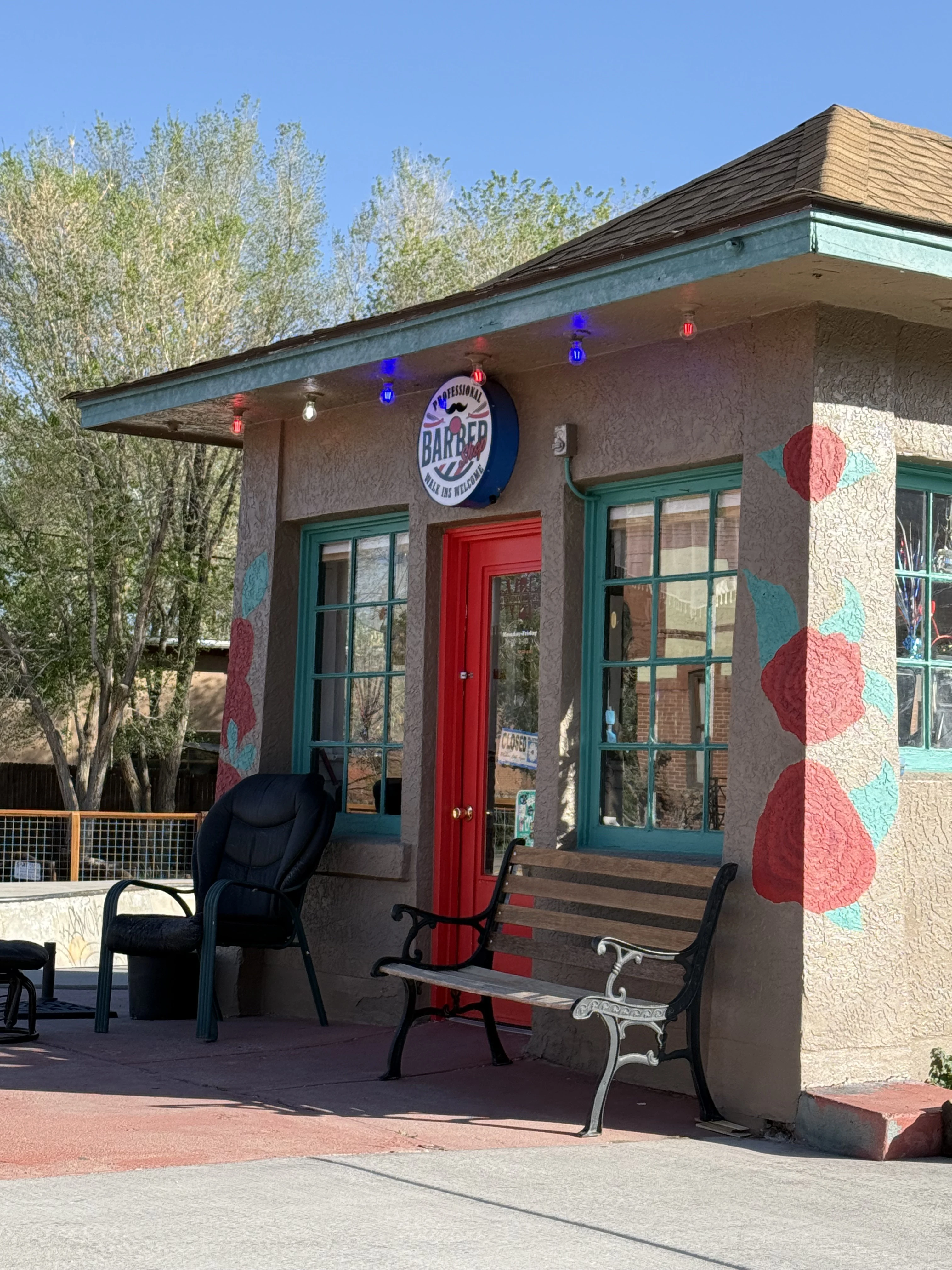 West End Barber exterior — red door and walk-ins welcome sign